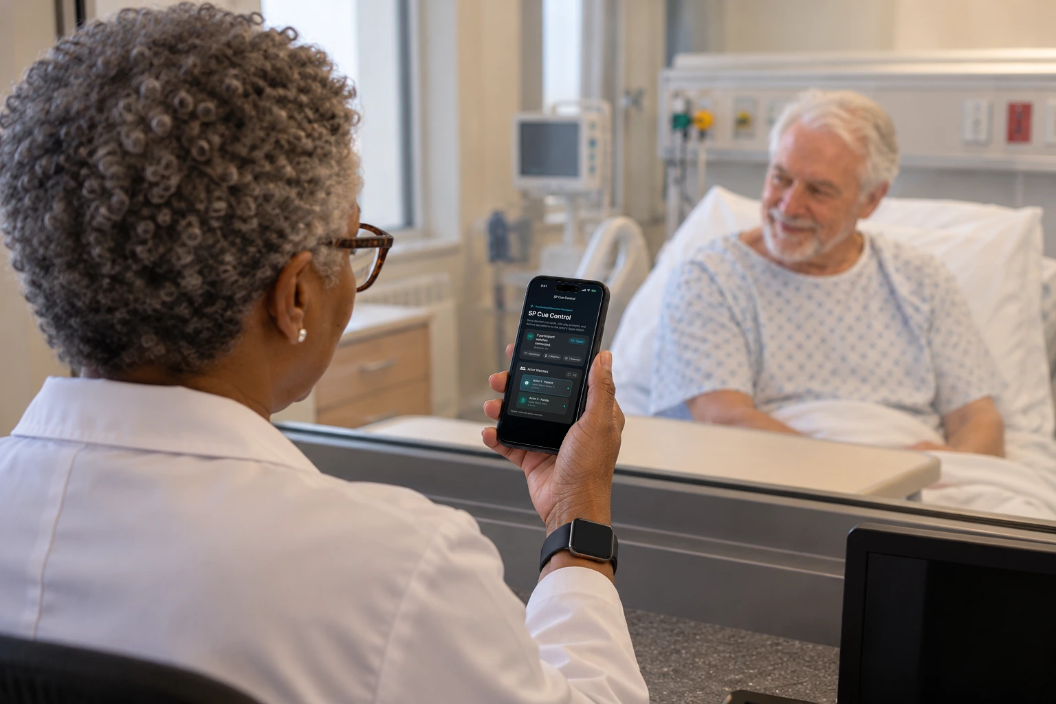A faculty member holds an iPhone showing the watch companion connected.